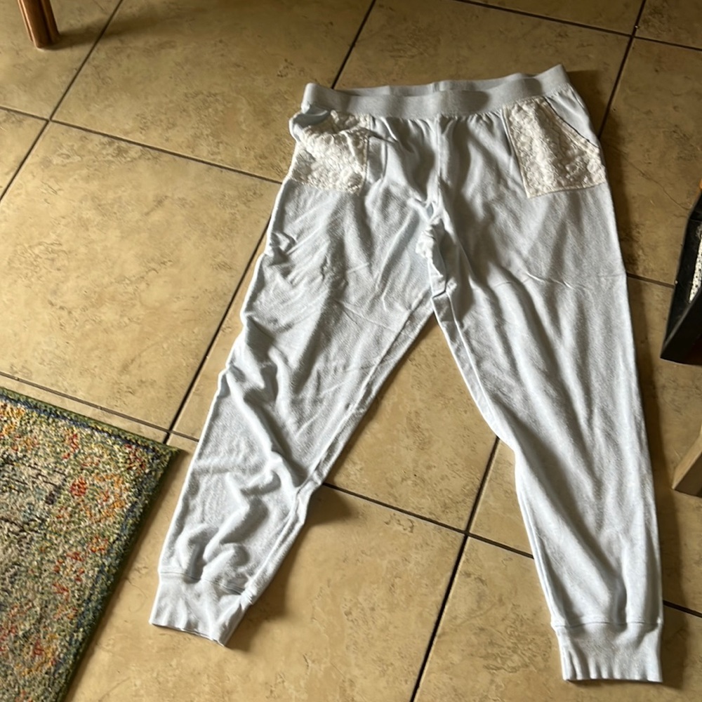 Light blue sweat pants two pockets on either side with lace.to comfortable